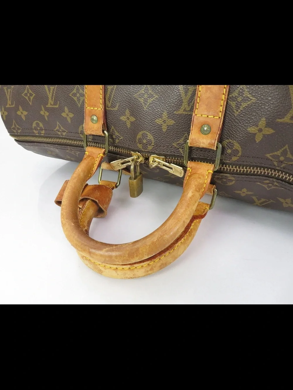 Louis Vuitton Monogram Canvas Keepall Duffel in Brown and Tan